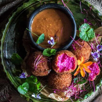 Beetroot & Garlean Cheese Croquettes: Thin sliced magma beet is mixed with Garlean cheese and fried with a panko coating. Served with a side of salmorejo.